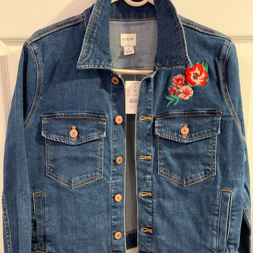 Denim jacket with floral aplique